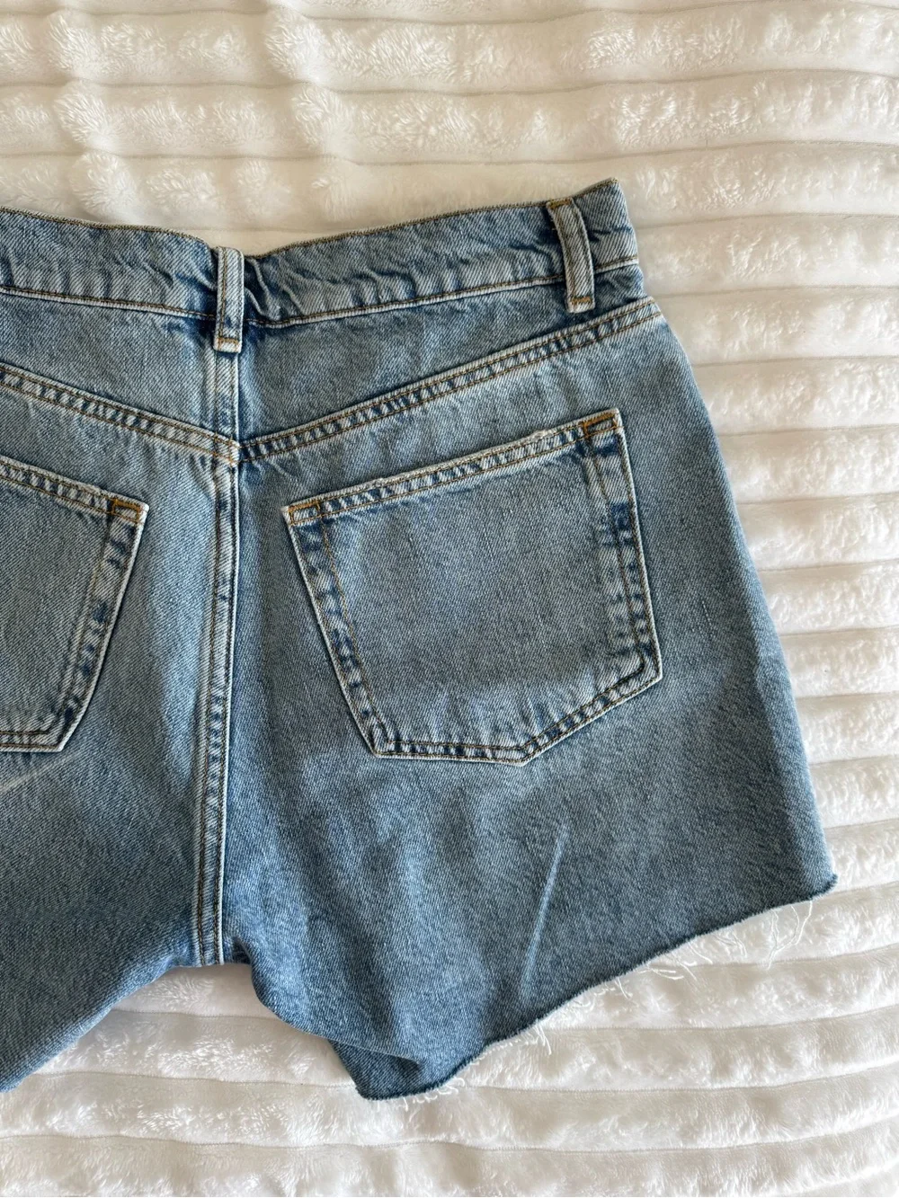 Reformation Light Blue Distressed Denim Shorts